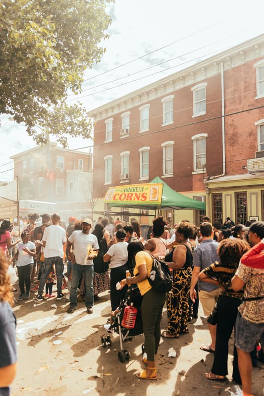 Caribbean Corns food vendor tent with smoke at the ODUNDE festival